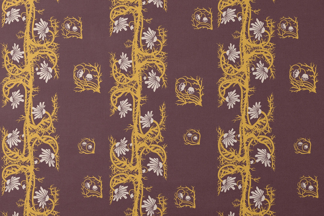 Marguerite in blackcurrant and marigold: spined, entwined stems forming vertical channels around massed daisy heads, translated from a c. 1904 Dutch linen damask finger towel by Cornelis van der Sluys. designs flat mockup