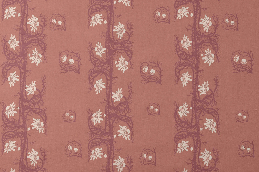 Marguerite in terracotta and pomegranate: spined, entwined stems forming vertical channels around massed daisy heads, translated from a c. 1904 Dutch linen damask finger towel by Cornelis van der Sluys. designs flat mockup