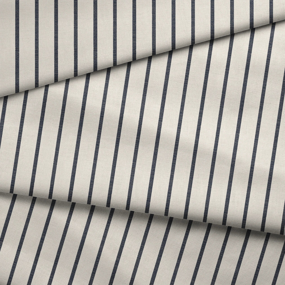 Navy woven-texture pencil stripe on a white ground: draped fabric fold preview.
