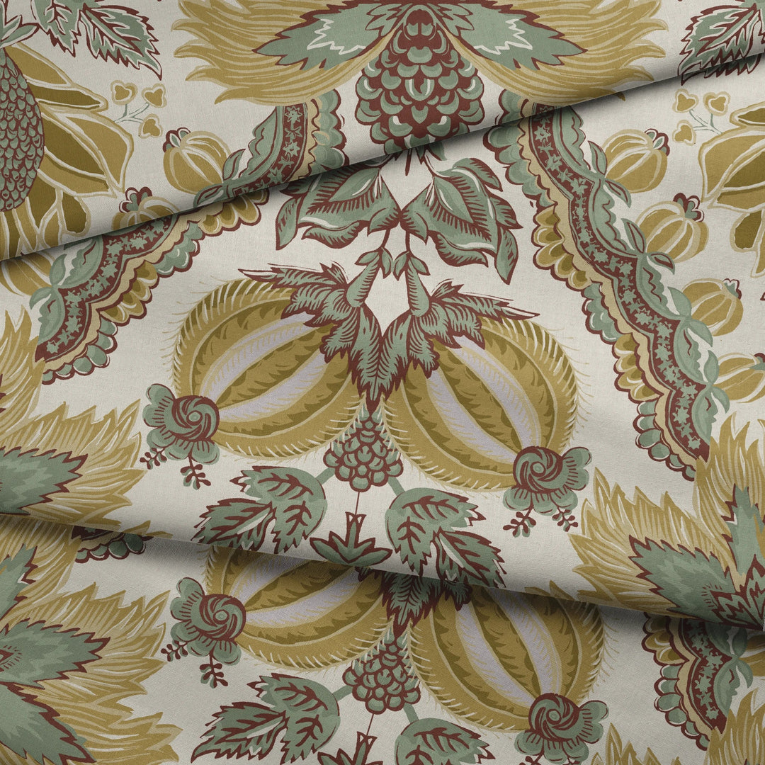 Flowering Pomegranate in linen and honey: an ogee lattice of lace borders framing a blossom held between two swelling pomegranates, translated from an 18th-century French block-printed quilt. fabric fold mockup