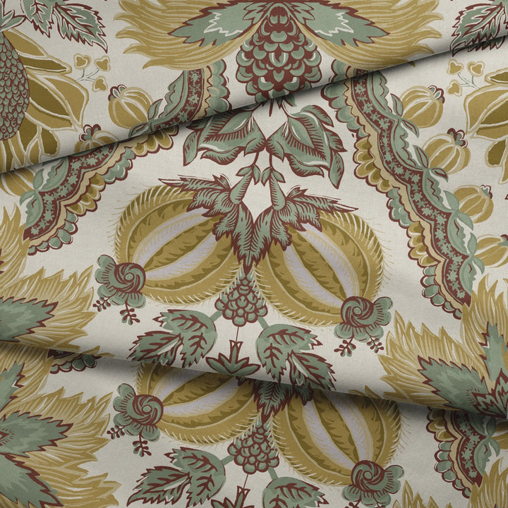 Flowering Pomegranate in linen and honey: an ogee lattice of lace borders framing a blossom held between two swelling pomegranates, translated from an 18th-century French block-printed quilt. fabric fold mockup