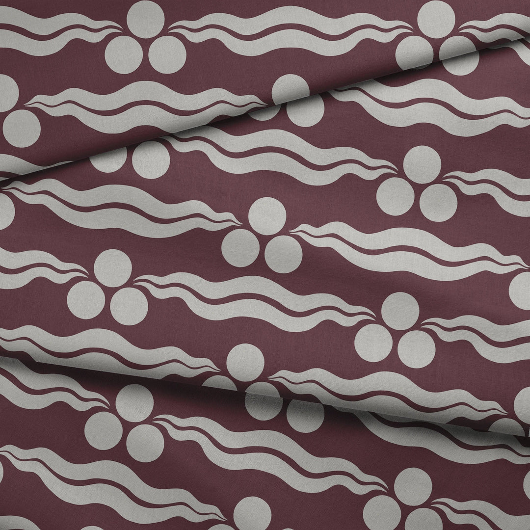Chintamani Tiger in blackcurrant and travertine: triple-disc chintamani roundels above paired wave bands, translated from a 15th-century Bursa silk velvet at The Metropolitan Museum of Art. draped fabric fold preview.