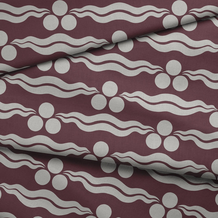 Chintamani Tiger in blackcurrant and travertine: triple-disc chintamani roundels above paired wave bands, translated from a 15th-century Bursa silk velvet at The Metropolitan Museum of Art. fabric fold mockup