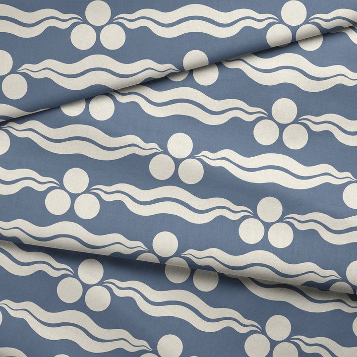 Chintamani Tiger in dusty blue and ivory: triple-disc chintamani roundels above paired wave bands, translated from a 15th-century Bursa silk velvet at The Metropolitan Museum of Art. fabric fold mockup