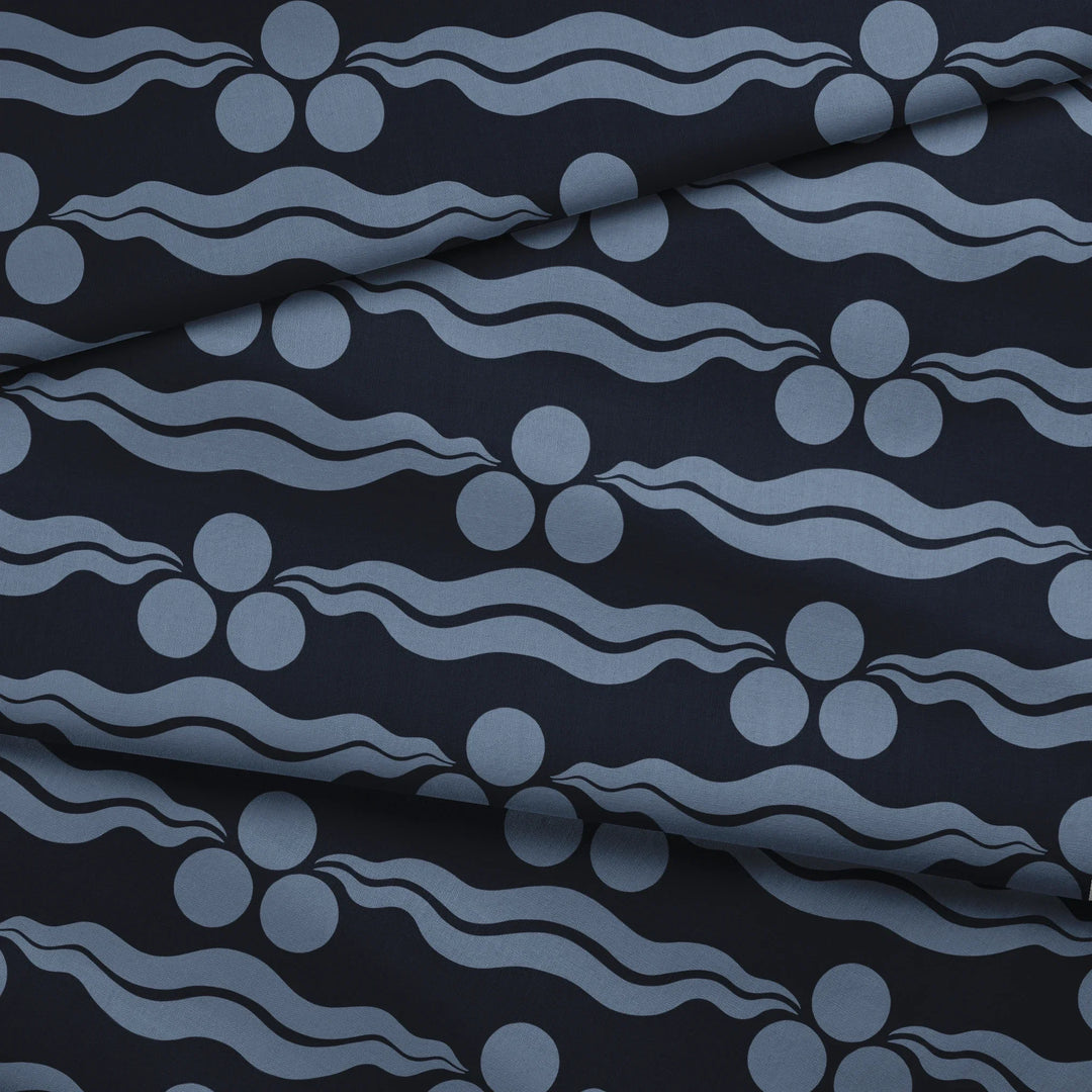 Chintamani Tiger in indigo and dusty blue: triple-disc chintamani roundels above paired wave bands, translated from a 15th-century Bursa silk velvet at The Metropolitan Museum of Art. fabric fold mockup