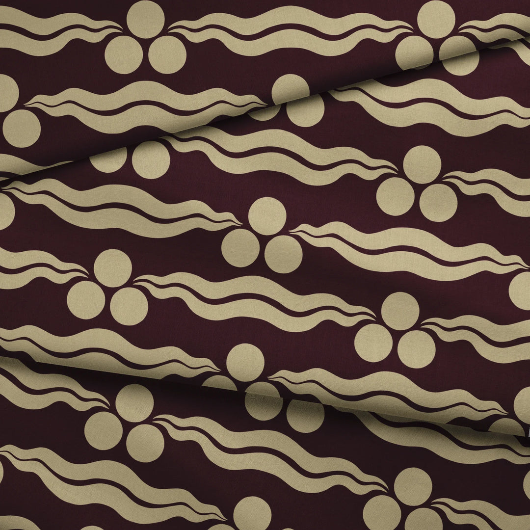 Chintamani Tiger in blackcurrant and flax: triple-disc chintamani roundels above paired wave bands, translated from a 15th-century Bursa silk velvet at The Metropolitan Museum of Art. fabric fold mockup