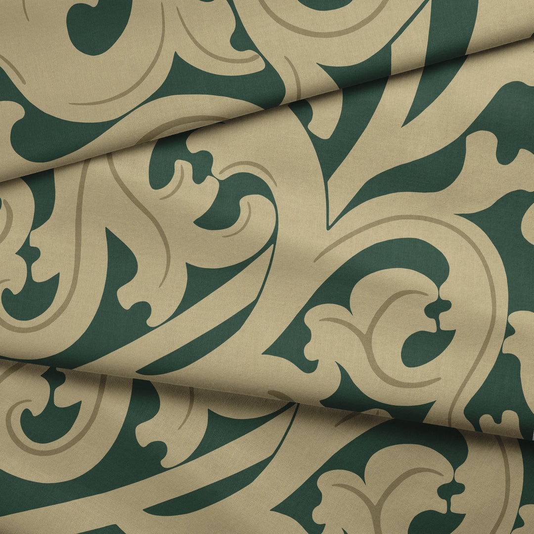 Large gold acanthus scroll motif on a green ground: draped fabric fold preview.