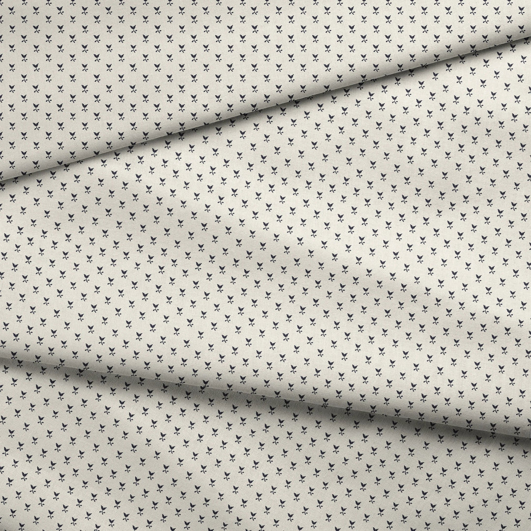 Near-black blue Second Empire tulip silhouette on an ivory ground: draped fabric fold preview.
