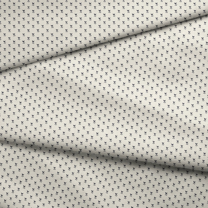 Near-black blue Second Empire tulip silhouette on an ivory ground: draped fabric fold preview.