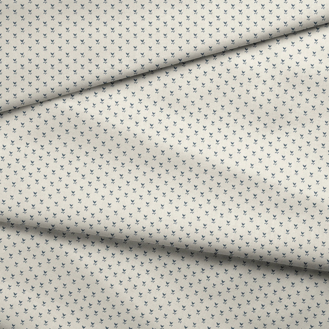 Blue-grey Second Empire tulip silhouette on a warm ivory ground: draped fabric fold preview.