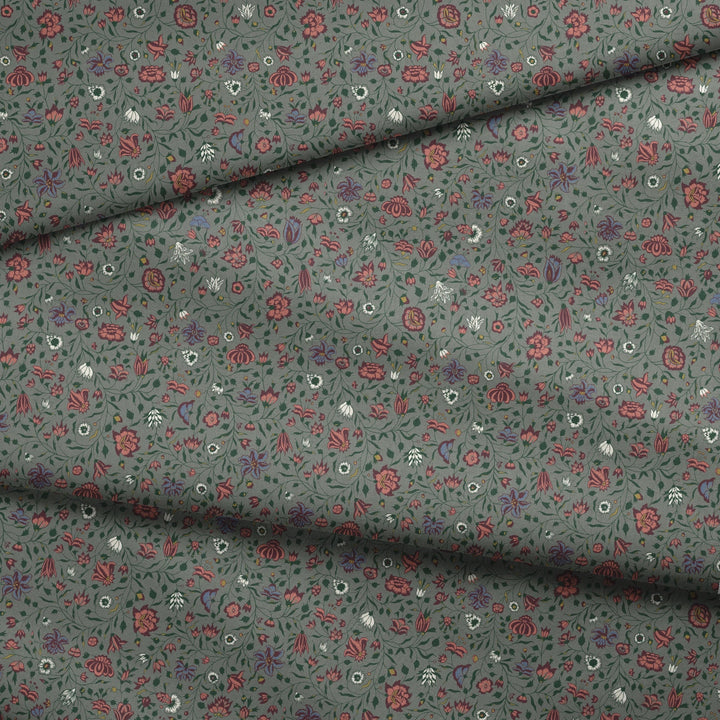 Dark purple 18th century Indian chintz vine on a grey-green ground: draped fabric fold preview.