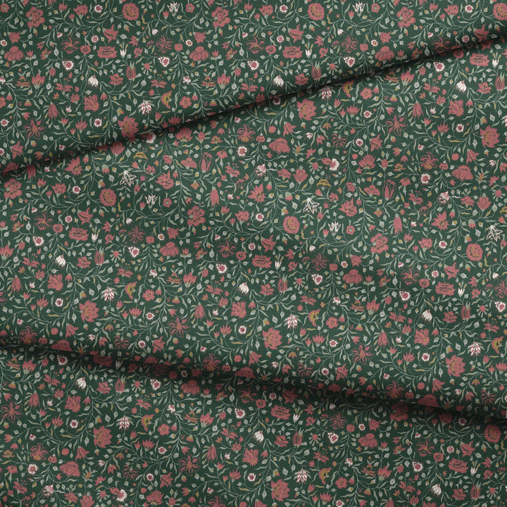 Red 18th century Indian chintz vine on a dark green ground: draped fabric fold preview.