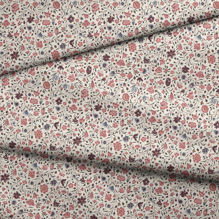 Red 18th century Indian chintz vine on a white ground: draped fabric fold preview.