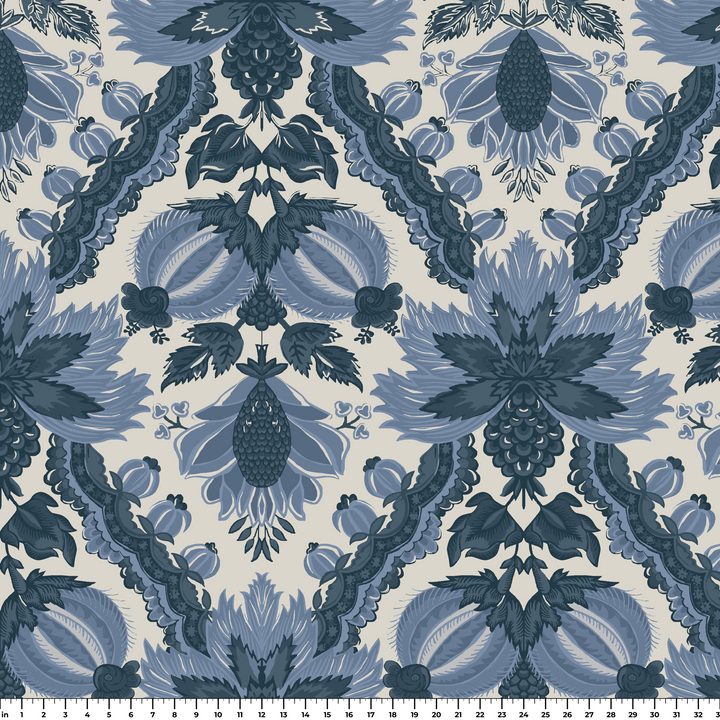 Flowering Pomegranate in linen and dusty blue: an ogee lattice of lace borders framing a blossom held between two swelling pomegranates, translated from an 18th-century French block-printed quilt. measurement scale view for fabric by the yard.