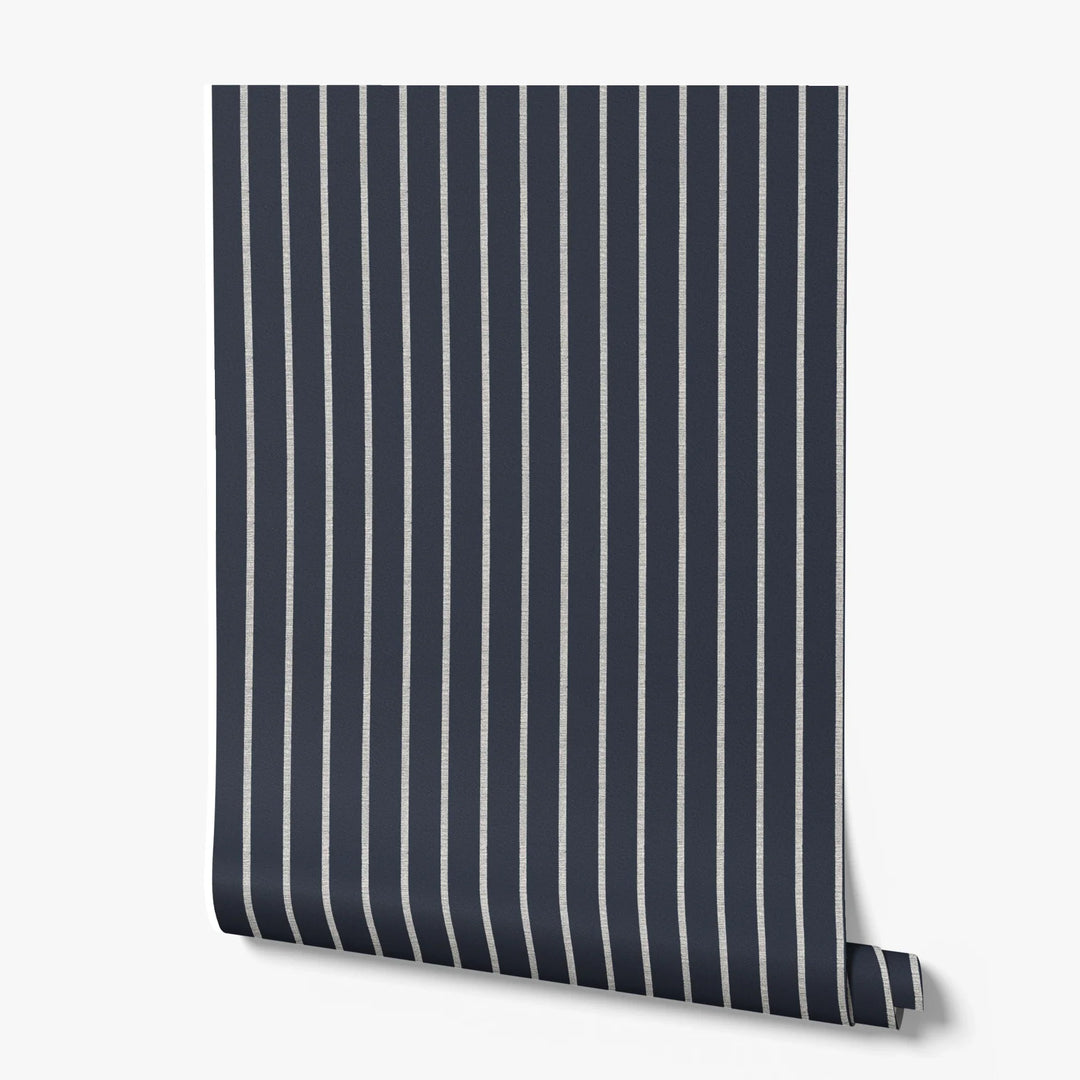 White woven-texture pencil stripe on a navy ground: printed wallpaper roll