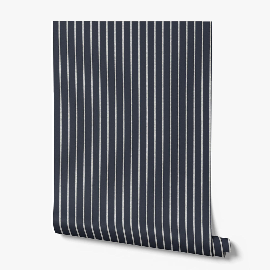 White woven-texture pencil stripe on a navy ground: printed wallpaper roll