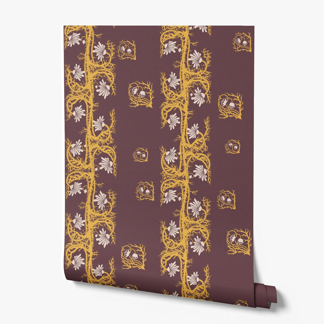 Marguerite in blackcurrant and marigold: spined, entwined stems forming vertical channels around massed daisy heads, translated from a c. 1904 Dutch linen damask finger towel by Cornelis van der Sluys. printed wallpaper roll