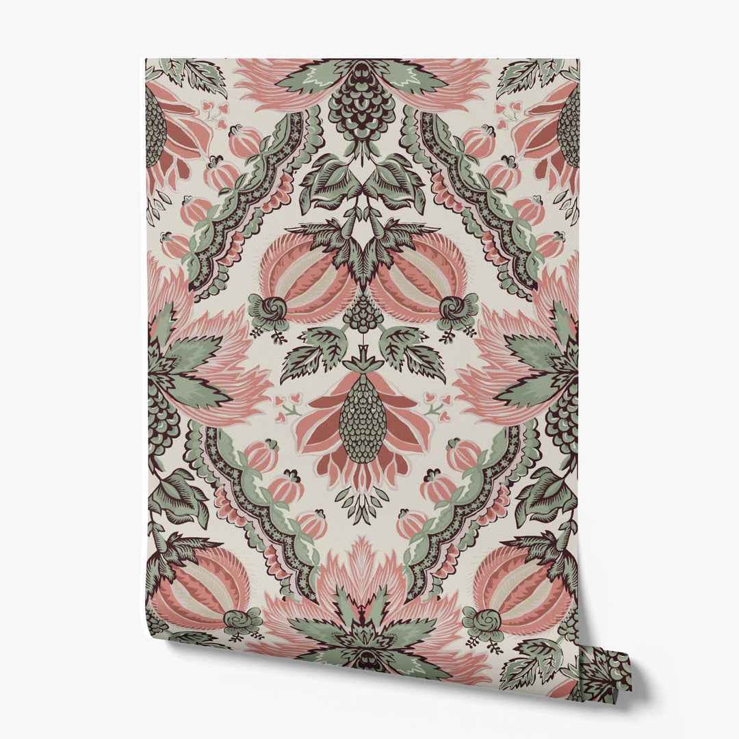 Flowering Pomegranate in linen and terracotta: an ogee lattice of lace borders framing a blossom held between two swelling pomegranates, translated from an 18th-century French block-printed quilt. printed wallpaper roll