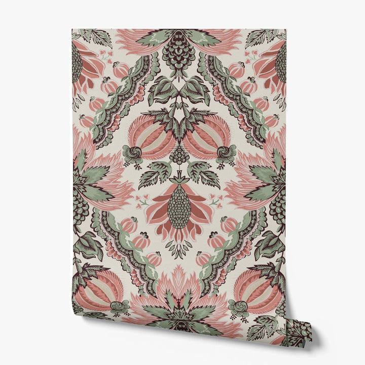 Flowering Pomegranate in linen and terracotta: an ogee lattice of lace borders framing a blossom held between two swelling pomegranates, translated from an 18th-century French block-printed quilt. printed wallpaper roll