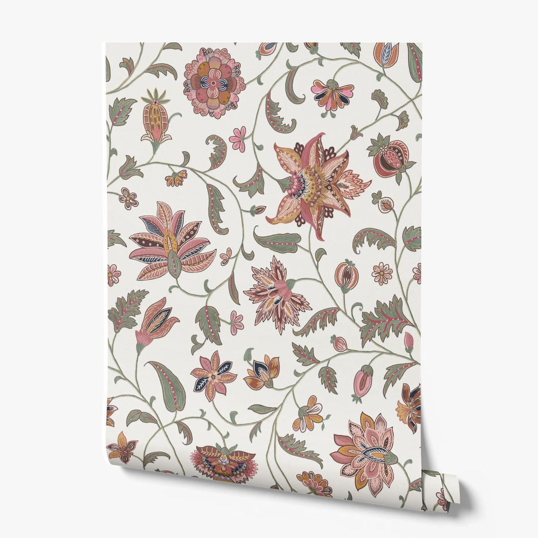 Red and navy floral vines on a white ground printed wallpaper roll